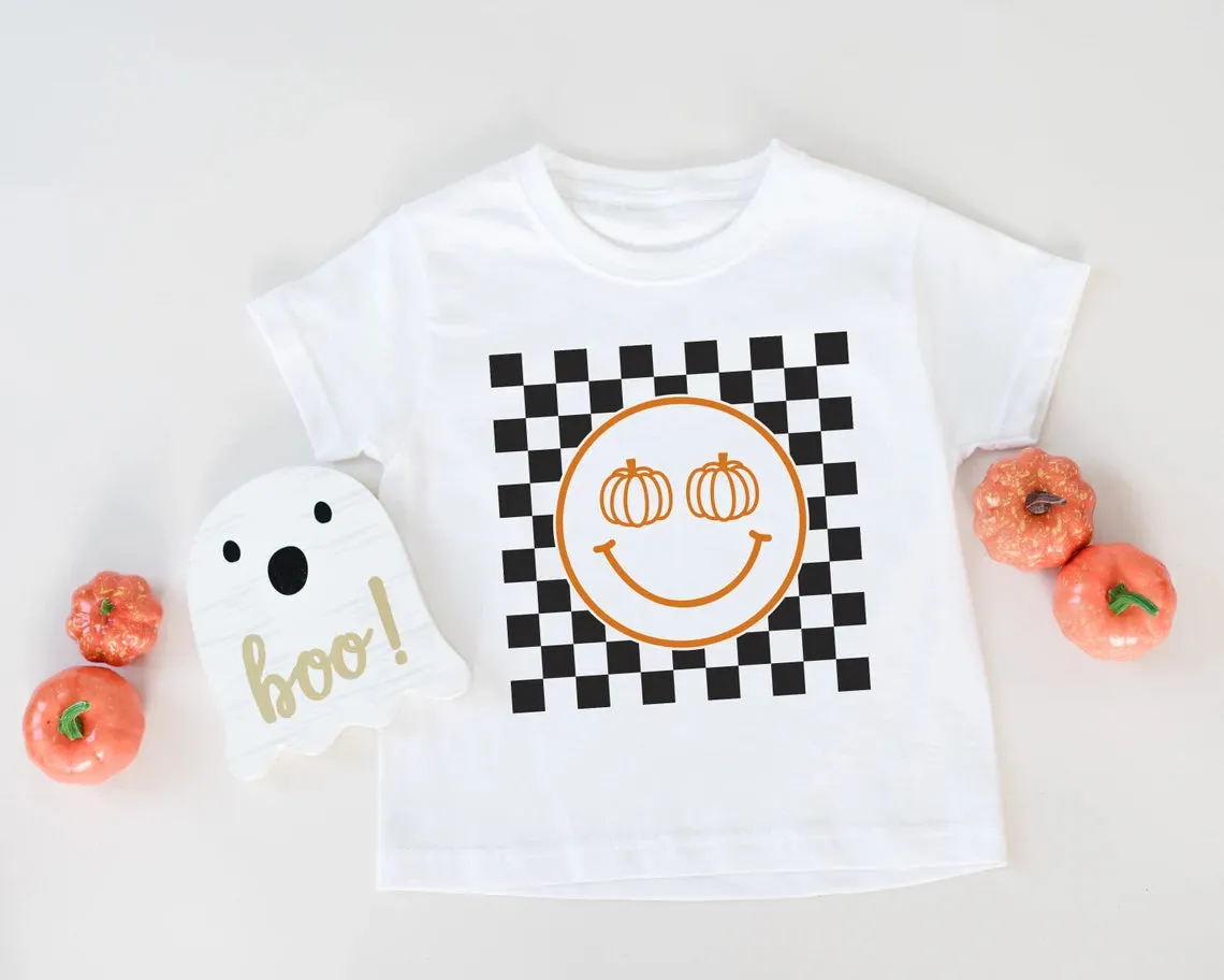 Pumpkin Checkered Smiley Face. Halloween T-shirt for Kids. Halloween Toddler Shirt. Pumpkin Baby Shirt. Fall Checkered Retro baby t-shirt.