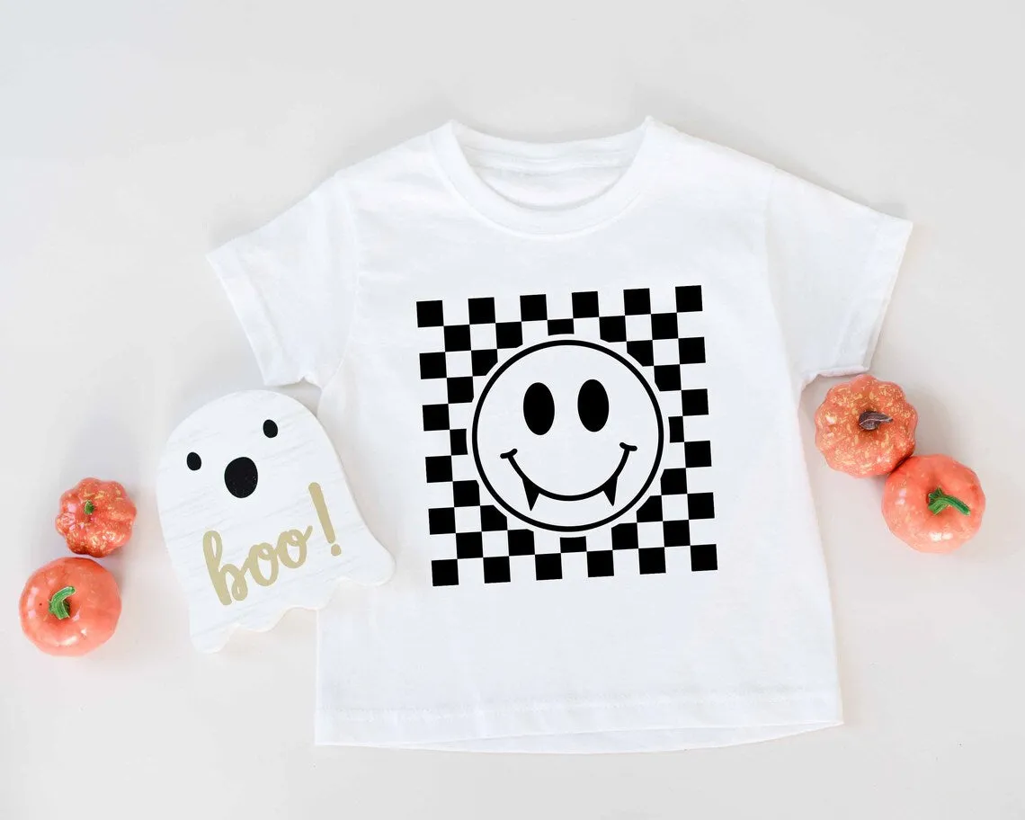 Vampire Smiley Face with Teeth. Halloween T-shirt for Kids. Halloween Toddler Shirt. Vampire Baby Shirt. Fall Checkered Retro baby t-shirt.