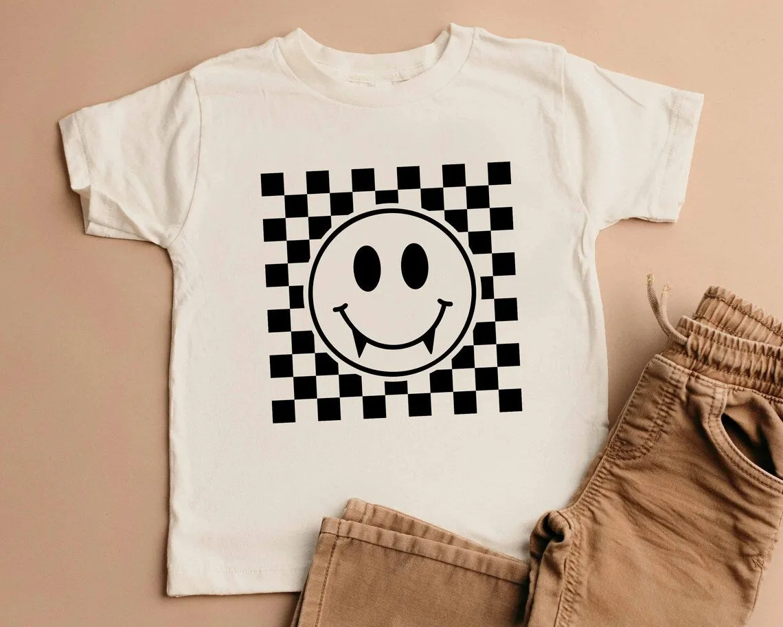 Vampire Smiley Face with Teeth. Halloween T-shirt for Kids. Halloween Toddler Shirt. Vampire Baby Shirt. Fall Checkered Retro baby t-shirt.